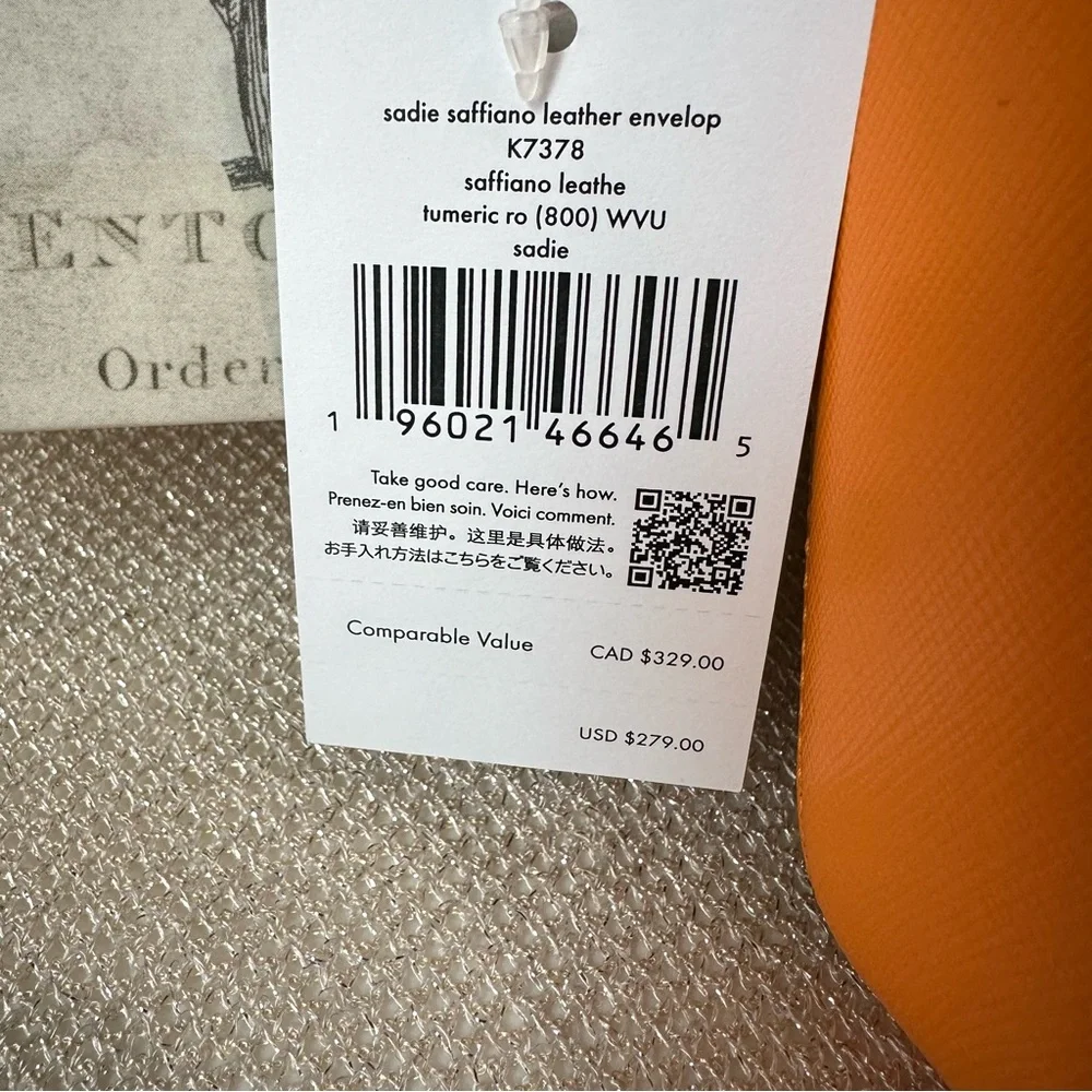 Kate Spade NY Sadie Envelope Crossbody in Turmeric Root Bright Orange K7338